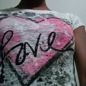 A white and pink love heart tee - shirt
